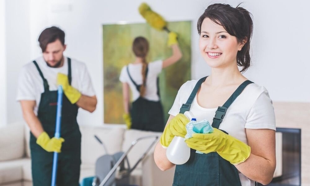 Lady smiling while cleaning